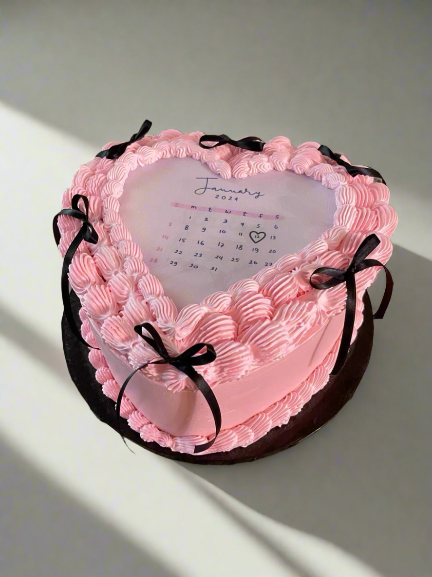 Pretty calendar cake for memorable days pink color snowberry cake