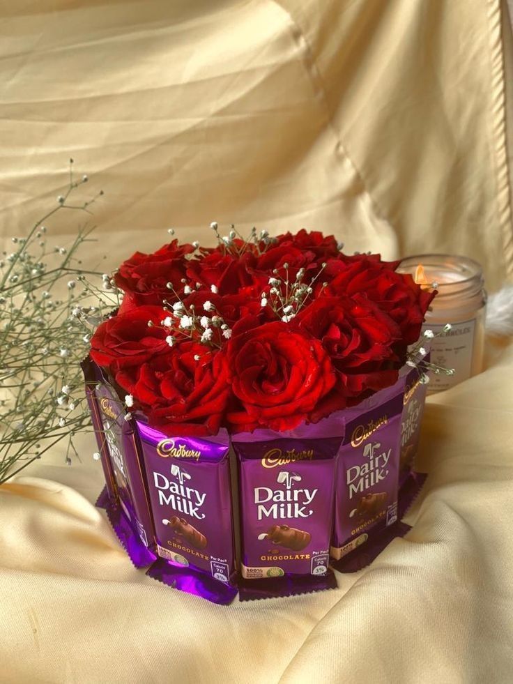 12 Diary milk chocolate 10 rose flower combo