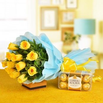 12 yellow rose flower bouquet with beautiful paking and 16 pice Ferrero rocher combo