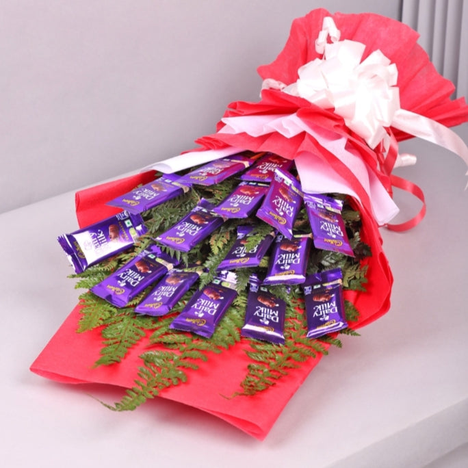 15 Diary milk chocolate Bouquet with Red and white paper paking iech 10 rupees with fillers