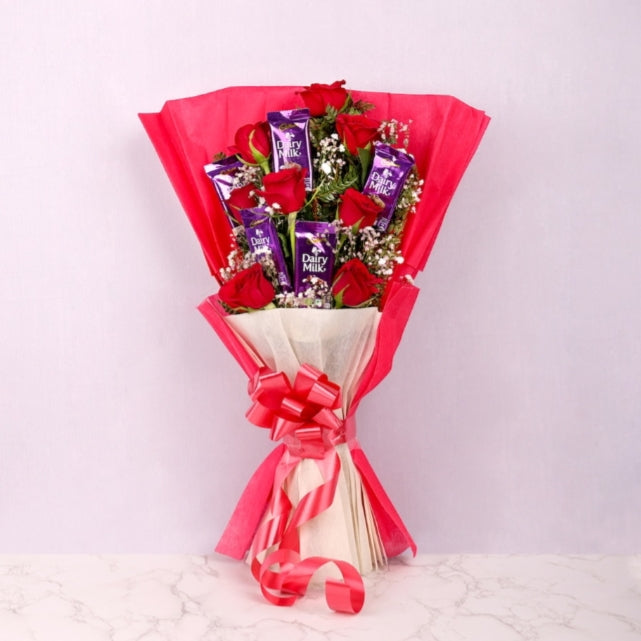 6 Rose flower bouquet with 5 diary milk Red pepper paking